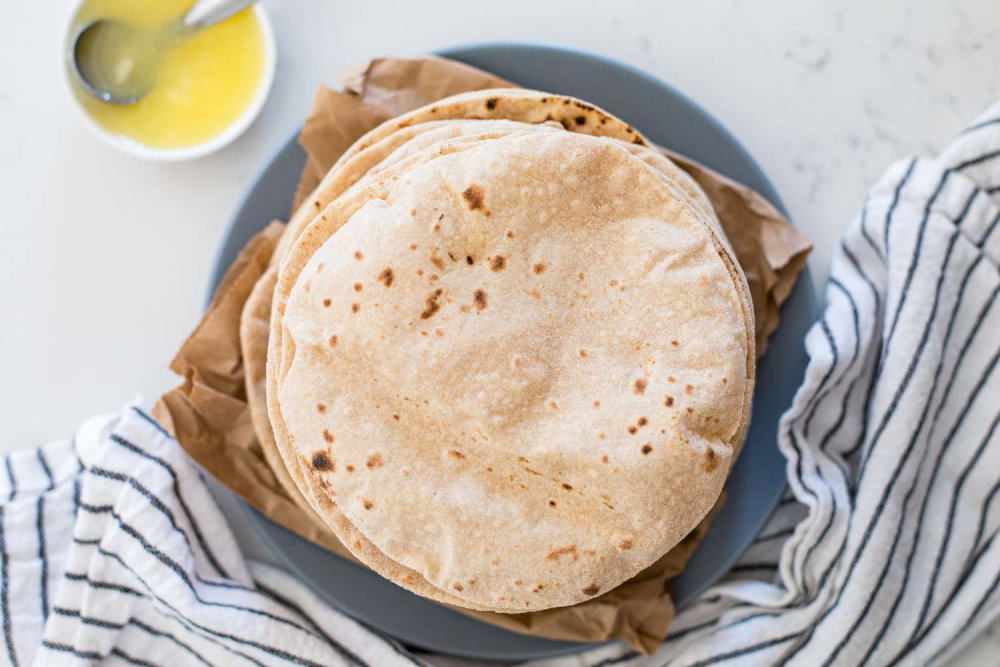 Roti is commonly served with dal, vegetable curries, or meats 